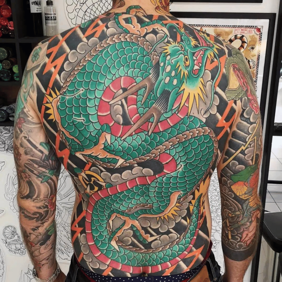 Coiled Dragon Japanese Tattoo Source @ghis_melou_tattooer via Instagram