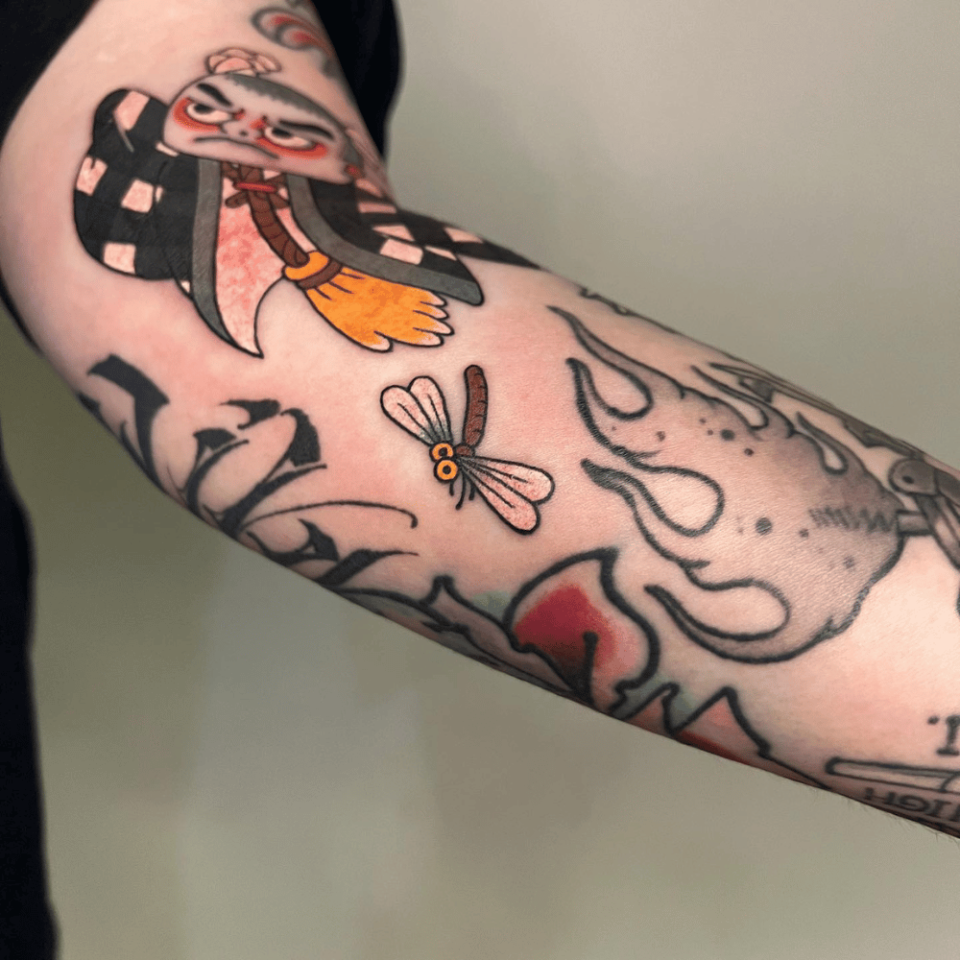 Dragonfly's Delicate Grace Japanese Tattoo Source @owen_yu_tattoos via Instagram