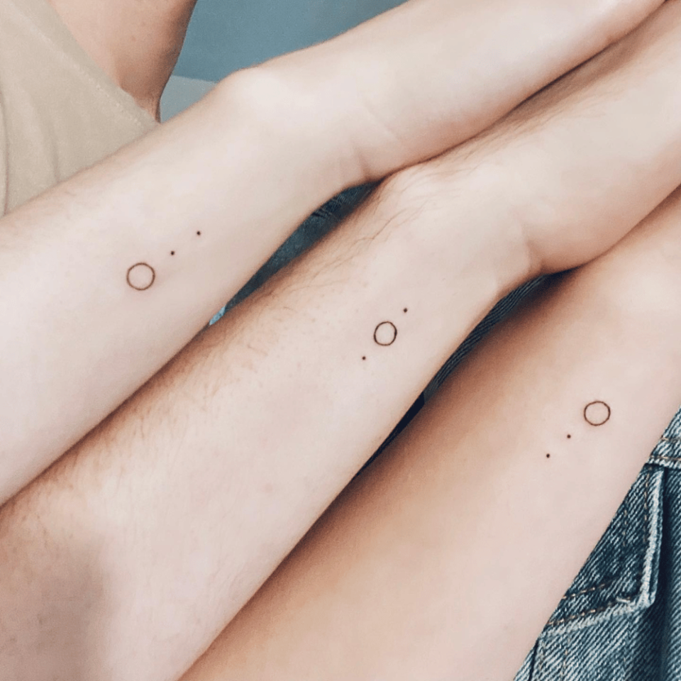 Identical Circle Matching Tattoo Source @the_metanoian via Instagram