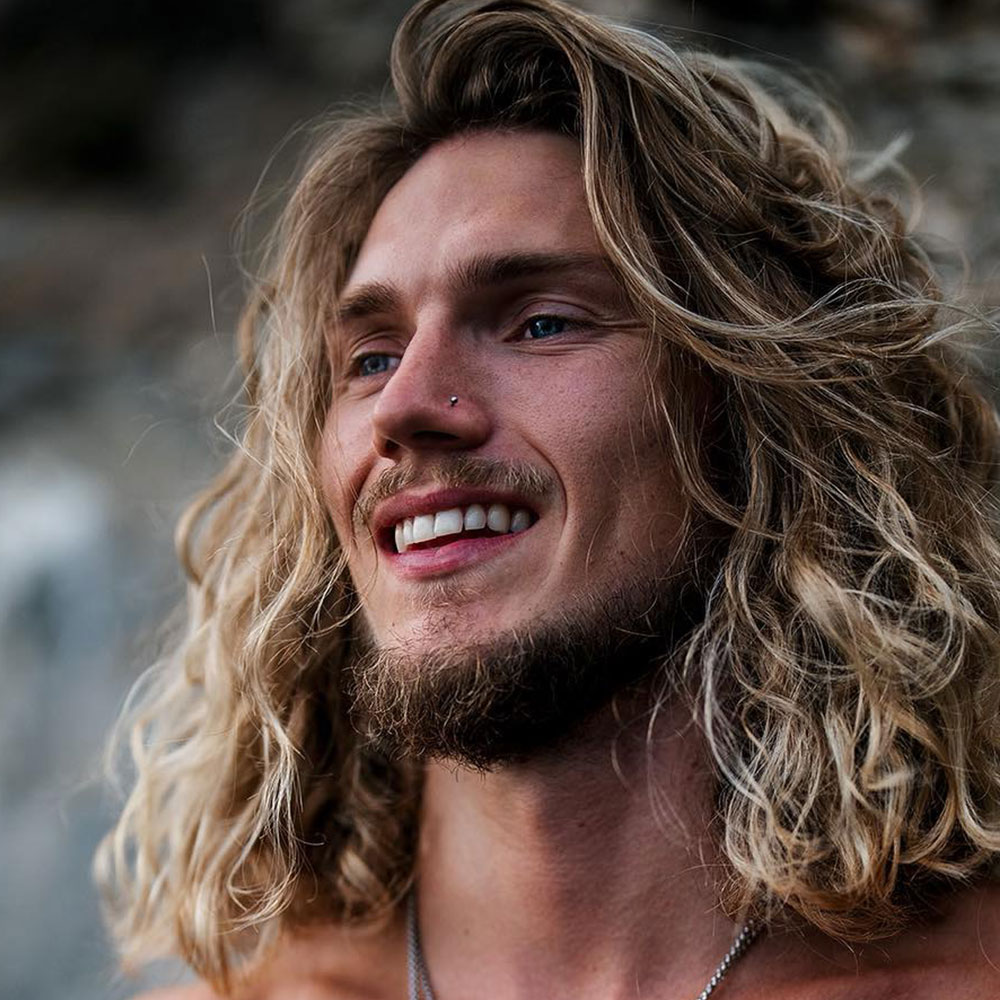 20 Rebel Long Curly Hairstyles for Men: Top Examples
