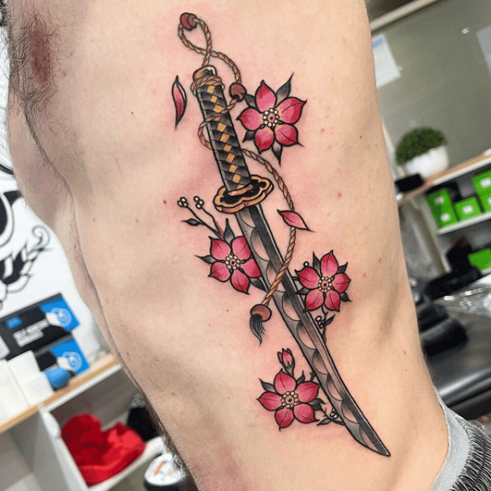Piercing Sword e Blossoming Cherry Japanese Tattoo Source_ @louistorrisi3 via Instagram