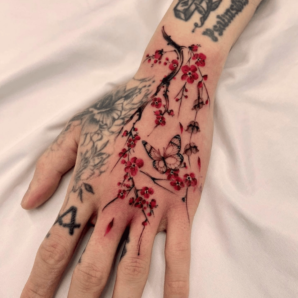 Sakura Blossoms Japanese Tattoo Source @japanese.ink via Instagram