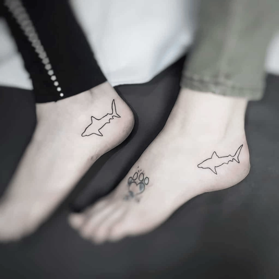 Sharks Matching Tattoo Source @minimaidtattoos via Instagram