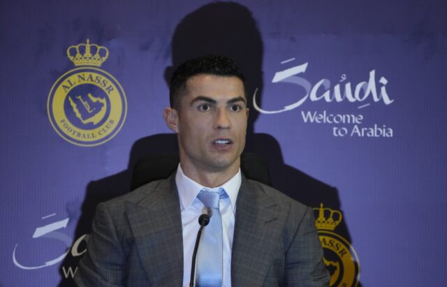 Cristiano Ronaldo sits in a press conference for his Saudi League side, Al-Nassr.