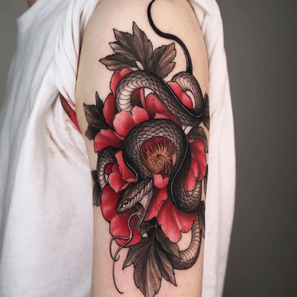 Floral Snake Tattoo Source @tattoosnob via Instagram