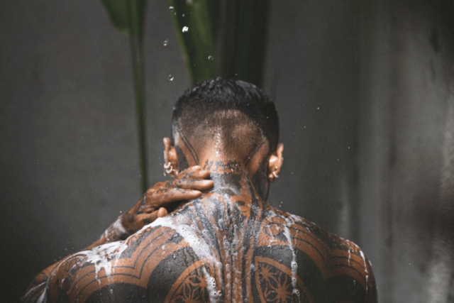 Man Shower With Tattoo Source Freepik.com