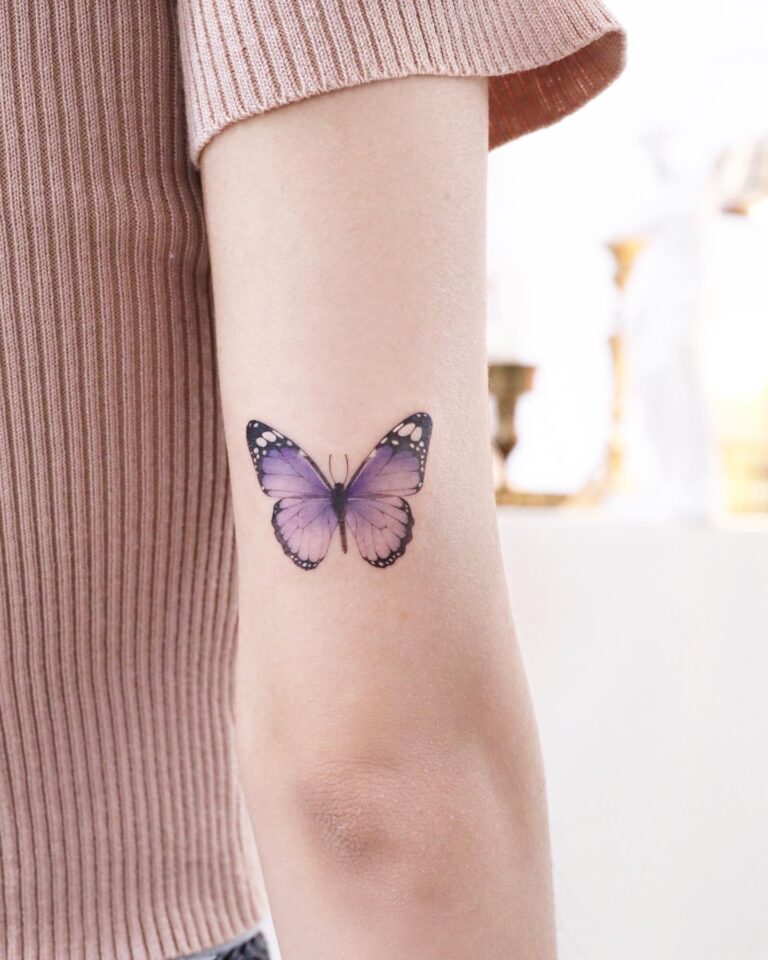 Purple Butterfly Tattoos Source @tattoo.haneul via Instagram