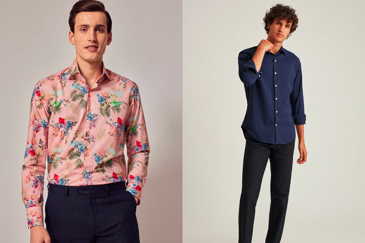 Two men wearing casual shirts that are good for a smart casual dress code. One wears a loral pink shirt with black trousers. The other wears a navy shirt with black jeans. 