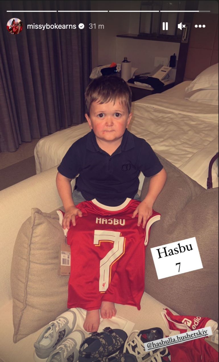 Hasbulla posing with a Liverpool FC shirt. 