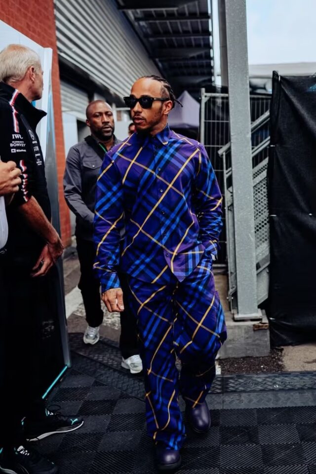 Lewis Hamilton wears a Burberry outfit at the Belgian Grand Prix