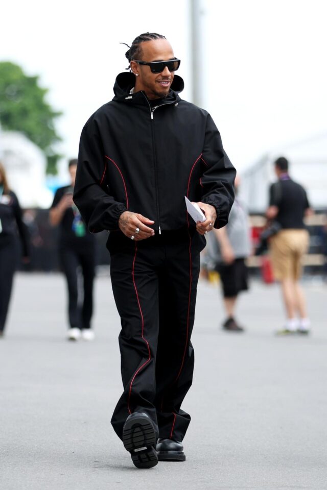 Lewis Hamilton wears Ferragamo tracksuit and Bottega Veneta sunglasses and boots at the Canada Grand Prix