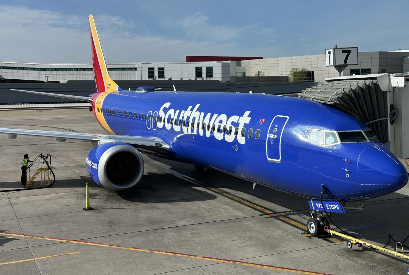 A Southwest Airlines plane sits at the gate at Love Field, in Dallas, TX. on March 19, 2023. 
