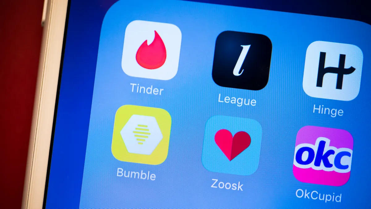 A phone screen with 6 different dating apps. 
