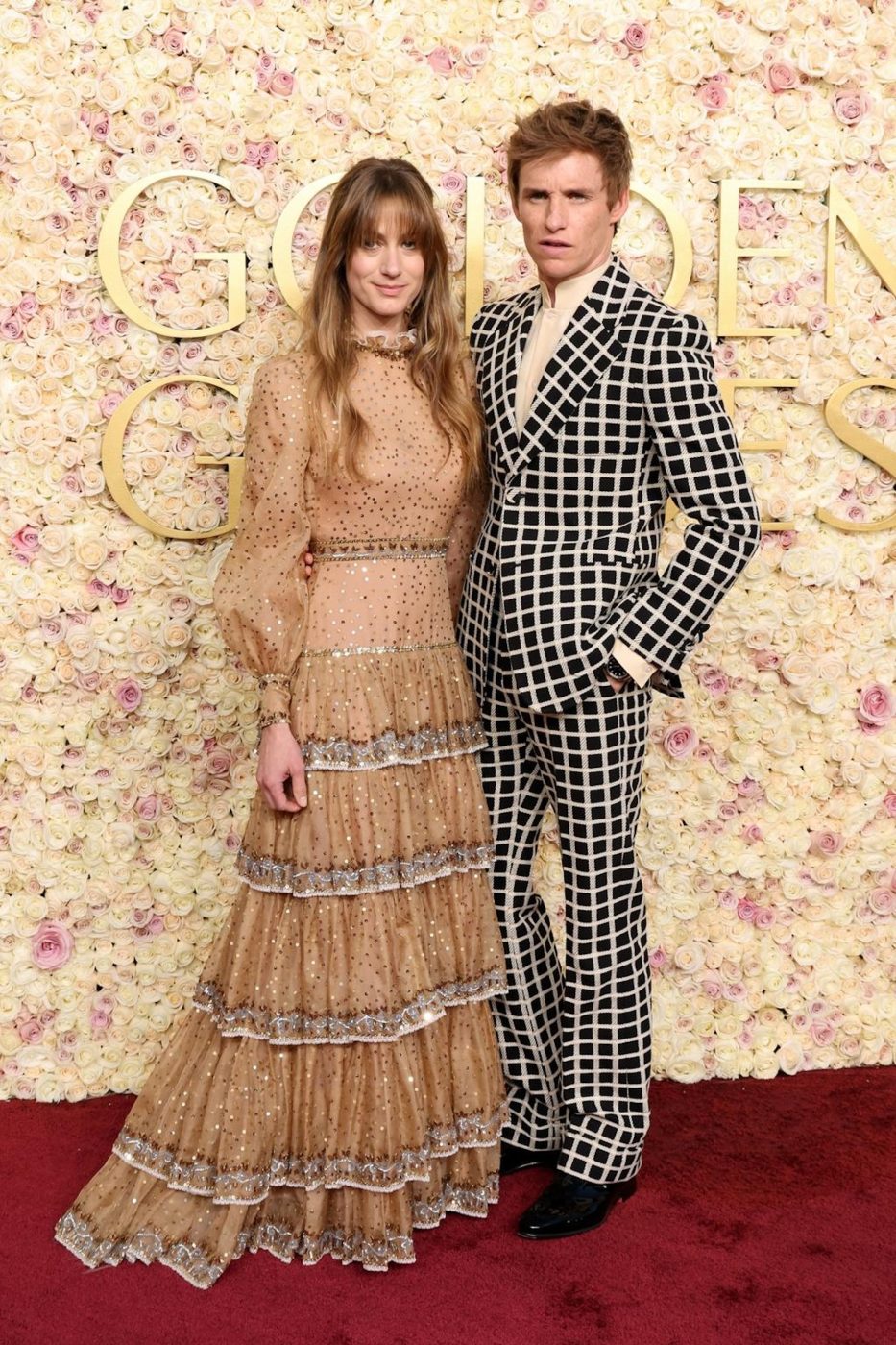 Eddie Redmayne and wife Hannah Bagshawe at the 2025 Golden Globes